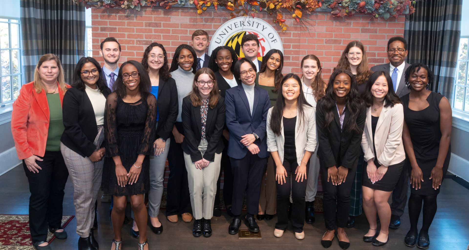 Scholars with Nancy Merrill and President Loh