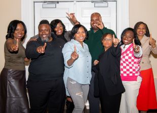 first cohort holds up one finger